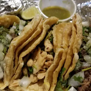 Pork, chicken and beef tacos
