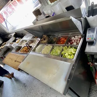  a woman in a restaurant kitchen