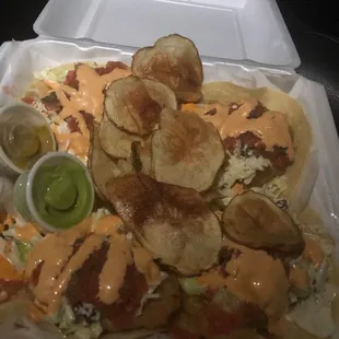 2 shrimp and 2 fish tacos. They are good (not the authentic Ensenada style fish taco but good in their own way).