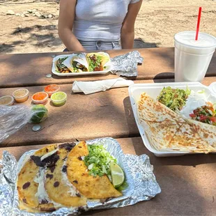 Birria tacos, al pastor quesadilla, al pastor tacos, &amp; horchata.