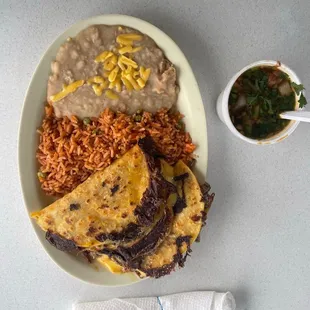 Birria tacos and consume