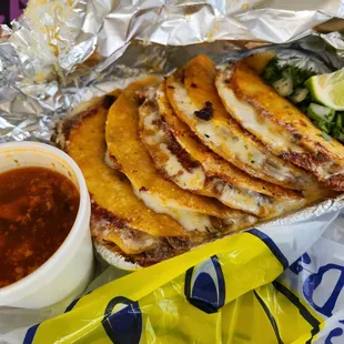 Birria Tacos with Queso and a small Consume