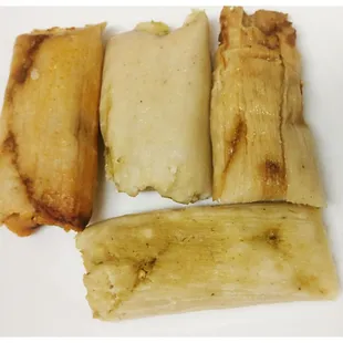 Tamales de Puerco (pork) &amp; de Pollo (chicken) - thicker,  shorter style tamales.