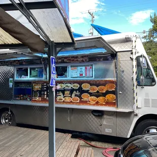 a food truck parked in a parking lot