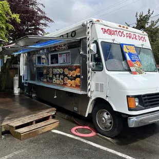 a food truck parked in a parking lot