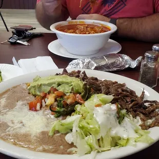 Carne asada plate and menudo.
