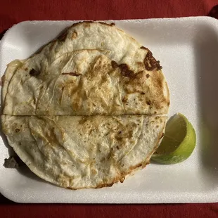 $6 Mulita--bistec, sausage, onion, cilantro, cheese