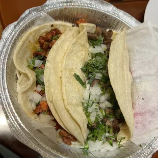 Al pastor and lengua tacos