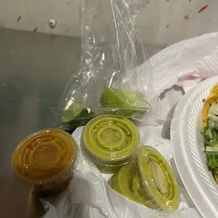 a plate of tacos and a salad