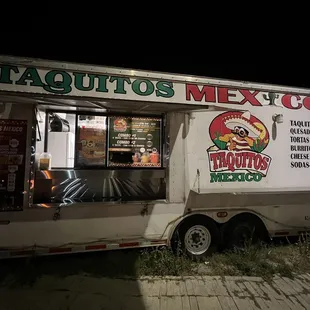 a food truck parked in a parking lot