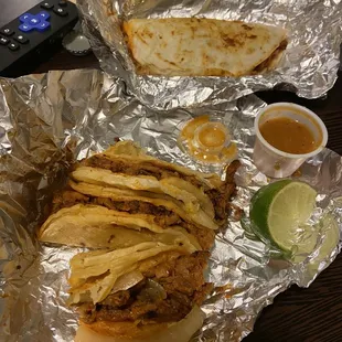 pastor mini tacos, pastor quesadilla. took a bite and loved it so much i had to take a picture :p