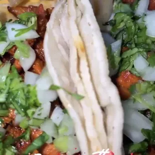 Tacos Al pastor - pork tacos so so good and the barbacoa tacos were delicious