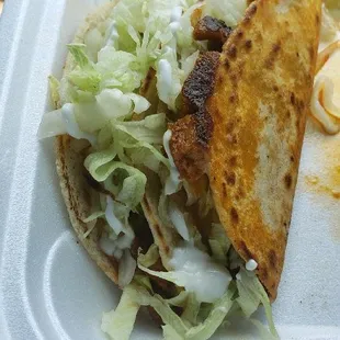 a close up of a taco