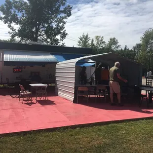 a man setting up a tent