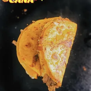 Tacos dorados birria