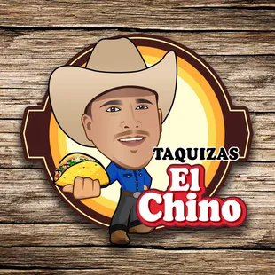 a man in a cowboy hat holding a taco