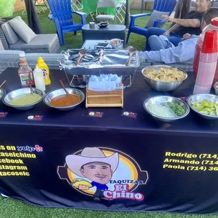 a table with a table cloth covered with a table cloth