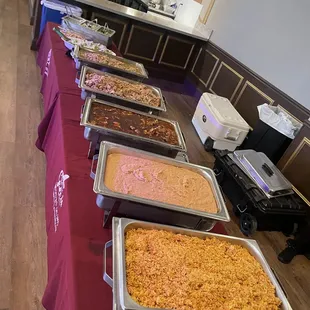 Buffet style setup 
Rice,beans.birria, carnitas,Chile verde