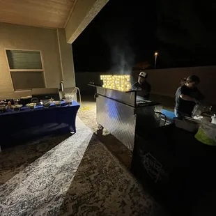 a group of people preparing food