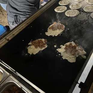 a man making taquies