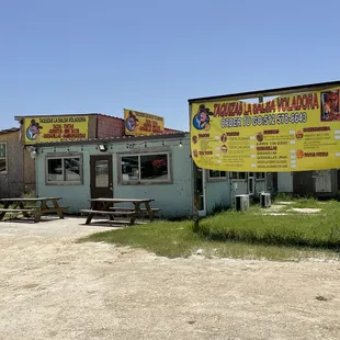 Outside; located inside a tire shop property.