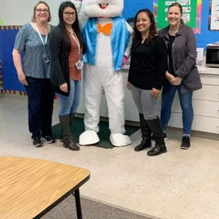 Andrew came to our class dressed as the Easter Bunny to deliver food and take pictures with the students and staff