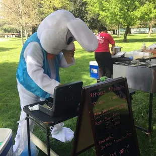 Andrew dressed up as the Easter Bunny at an event at the park