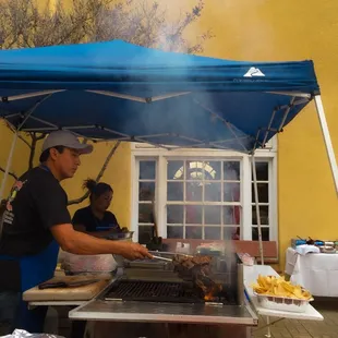 Victor preparing the delicious food for a retirement party