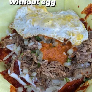 Birria chilaquiles with egg
