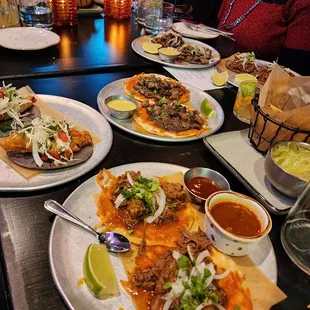 a variety of mexican food on plates