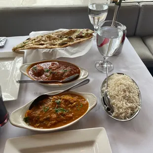 Chicken vindaloo (bottom) and salmon curry (top)