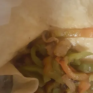 Here is the wrap, grilled veggies, no cheese, as described in Tara's menu under "Veggie Wrap." It was gross and went into the trash.