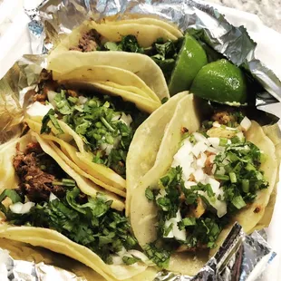 Pollo, asada, barbacoa and pastor street tacos. Excellent.