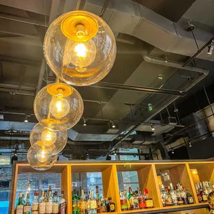 a bar with bottles of alcohol