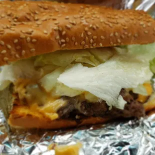 The cheeseburger on sesame seed French bread