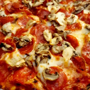 Look what followed me back to my hotel! 10&quot; thin crust with pepperoni and mushrooms, $13 out the door.