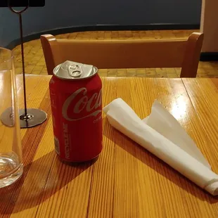 Tabletops recycled from bowling alley wood lanes- tribute to historic Kiame's bowling alley once located across the road.