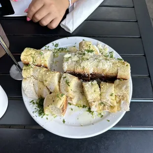Large bread. Super tasty with the shaved Parmesan