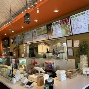 a view of a restaurant counter