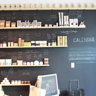a blackboard with a chalk board with a calendar on it