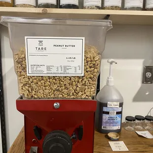 a blender with peanuts in it