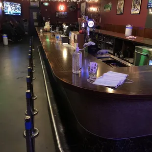 a bar with a long counter