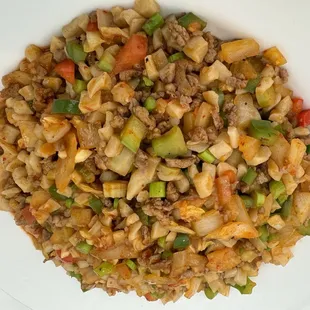 a plate of food with meat and vegetables