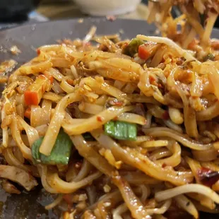 Shrimp pad Thai, Ka Pow chicken, pork and chicken skewers.