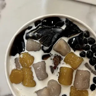 Grass jelly house specialty #3 with milk poured in