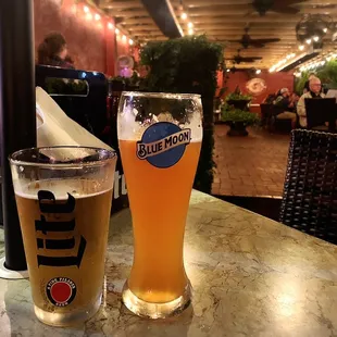 a pint and a glass of beer