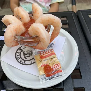 a plate of shrimp and chips