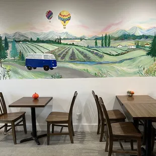 a table and chairs in a restaurant