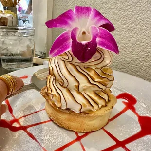 a pastry with a flower on top