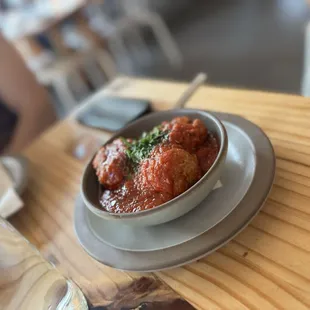Meatballs - 10! Must try the meat is so juicy and the sauce fire. 3 meatballs per order . Why is spaghetti and meatballs not on the menu!!!